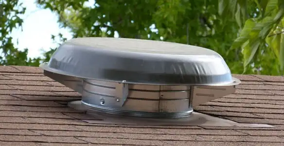 attic fan installation services with low-profile roof ventilation unit in Cincinnati, OH