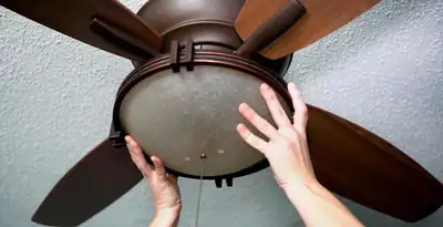 Ceiling fan repair and reinstallation on ceiling mount in Cincinnati, OH