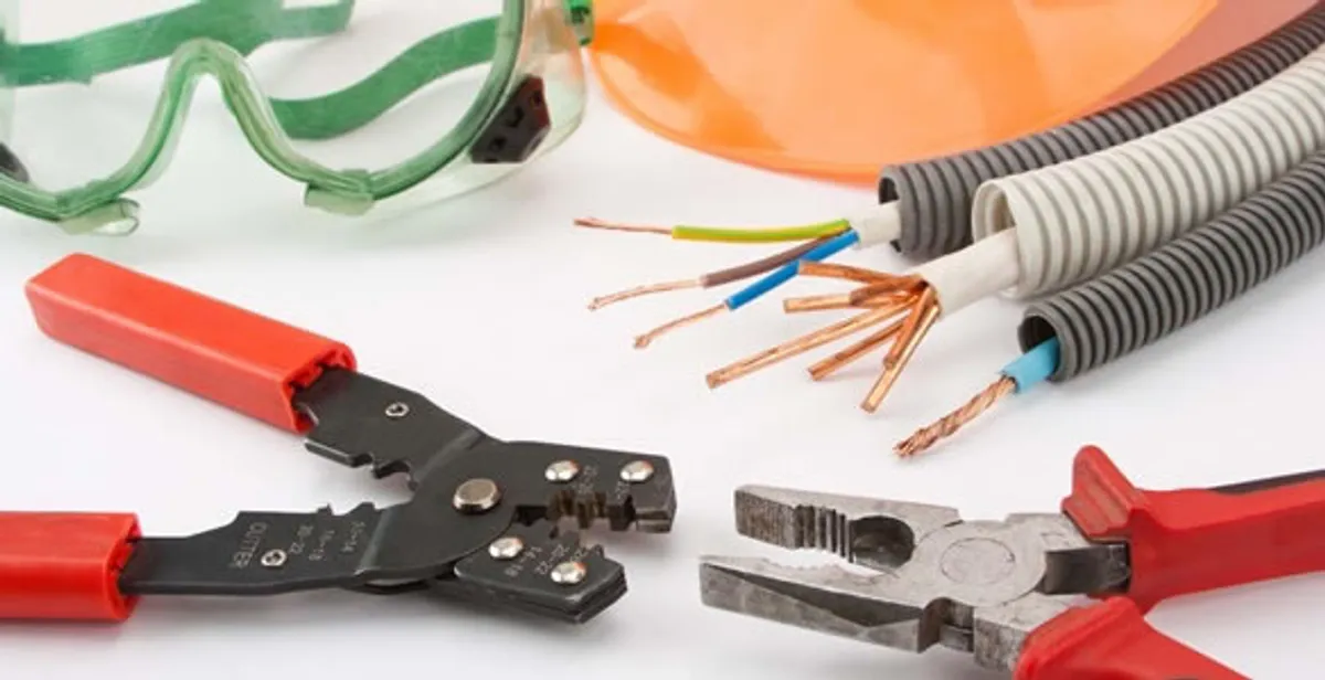 Electrical wiring repair with professional tools and safety equipment in Covington, KY