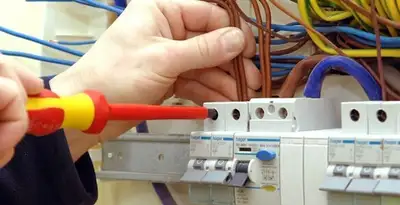 electrician services performing professional electrical panel wiring and connections in Cincinnati, OH