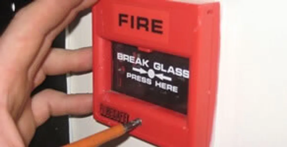fire alarm installation service showing manual fire alarm pull station installed by licensed electricians in Cincinnati, OH