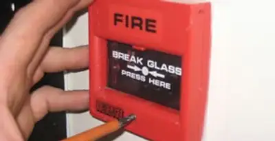 fire alarm installation service showing manual fire alarm pull station installed by licensed electricians in Cincinnati, OH