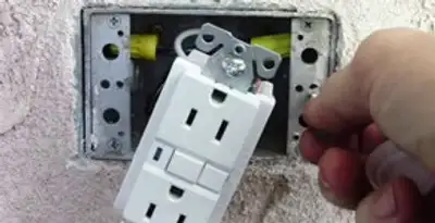 gfci circuits service showing installation of a ground fault circuit interrupter outlet by licensed electricians in Cincinnati, OH