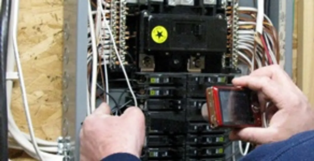 Home electrical inspection of circuit breaker panel by licensed electrician in Cincinnati, OH