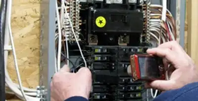 Home electrical inspection of circuit breaker panel by licensed electrician in Cincinnati, OH