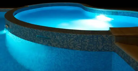 pool light installation and repair services highlighting illuminated pool interior lighting in Cincinnati, OH
