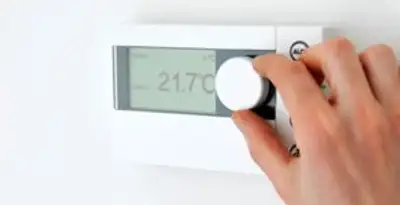 Thermostat installation service with professional adjusting temperature control in Cincinnati, OH