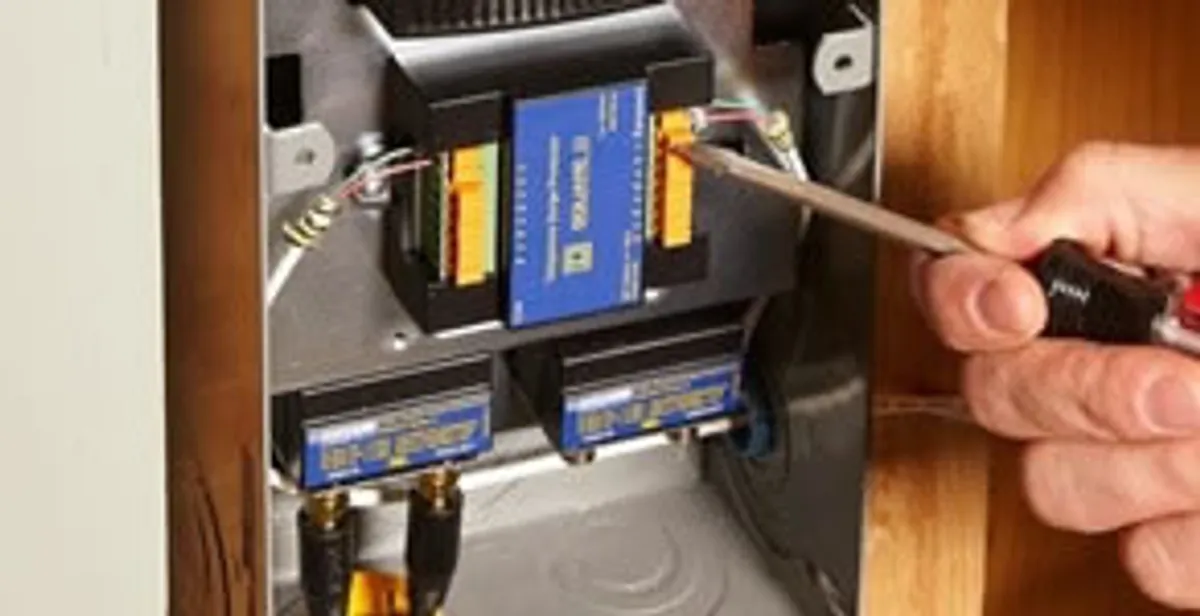 Whole home surge protection device being installed by a licensed electrician to protect electrical systems in Cincinnati, OH